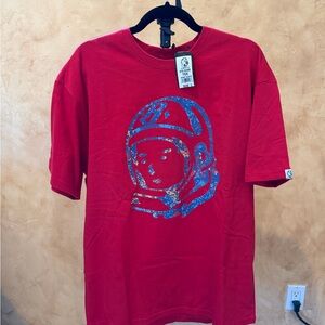 Red Graphic T-Shirt with Blue Astronaut Design